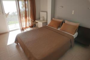 Posteľ alebo postele v izbe v ubytovaní Renting House GALINI