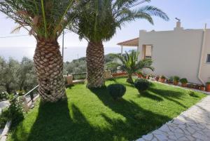 Vonkajšia záhrada v ubytovaní Renting House GALINI