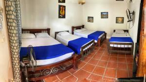 Postel nebo postele na pokoji v ubytování Finca Hotel Cabaña Fercho
