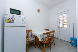 Kuchyňa alebo kuchynka v ubytovaní Apartment Pisak 5975c