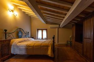La Tenuta dei Fiori客房内的一张或多张床位