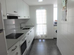 Kuchyňa alebo kuchynka v ubytovaní PARQUE MOTA - AlquIler solo a familias