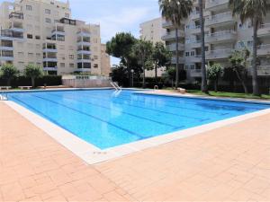 Bazén v ubytovaní PARQUE MOTA - AlquIler solo a familias alebo v jeho blízkosti