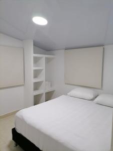 Postel nebo postele na pokoji v ubytování CASA CAMPESTRE LAS MARIAS