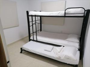 Postel nebo postele na pokoji v ubytování CASA CAMPESTRE LAS MARIAS