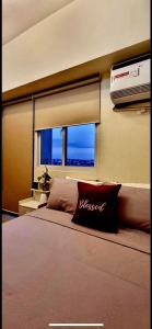 TV a/nebo společenská místnost v ubytování Field Residence SMDC 1BR w/ Netflix + 28 fotografií