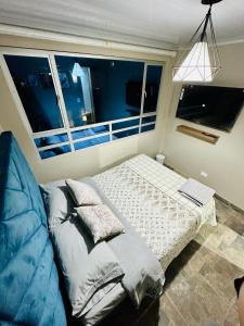 Voodi või voodid majutusasutuse Habitación cerca al aeropuerto el Dorado Bogota toas