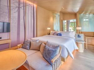 Hotel MYS Khao Yai客房内的一张或多张床位