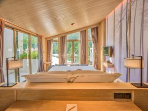 Hotel MYS Khao Yai客房内的一张或多张床位