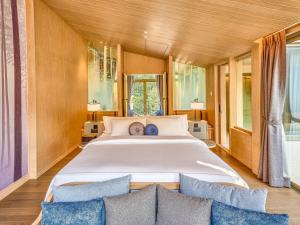 Hotel MYS Khao Yai客房内的一张或多张床位