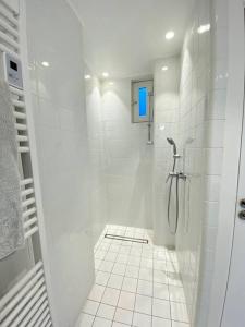 Kúpeľňa v ubytovaní Appartement proche plage avec vue mer