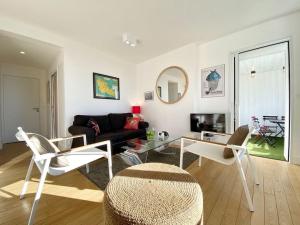 Posedenie v ubytovaní Appartement proche plage avec vue mer