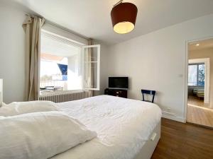 Posteľ alebo postele v izbe v ubytovaní Appartement proche plage avec vue mer