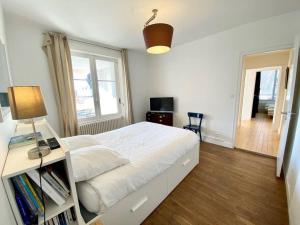 Posteľ alebo postele v izbe v ubytovaní Appartement proche plage avec vue mer
