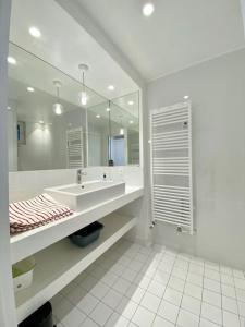 Kúpeľňa v ubytovaní Appartement proche plage avec vue mer