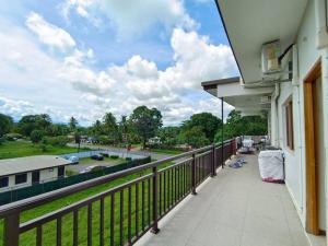 a balcony of a building with a view of a street at 2 bedroom Apartment in Nadi