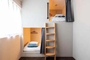 Postel nebo postele na pokoji v ubytování Akasaka The Hostel