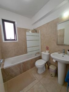 Ванная комната в AFRODITI APARTMENTs