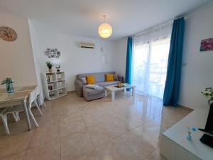 Гостиная зона в AFRODITI APARTMENTs