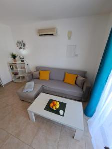 Гостиная зона в AFRODITI APARTMENTs