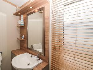 Koupelna v ubytování La Hacendia Lodge + 28 fotografií