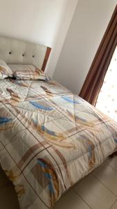 מיטה או מיטות בחדר ב-Oasis comfort