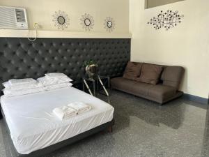 Postel nebo postele na pokoji v ubytování Dampa Poolside Events & Accommodation