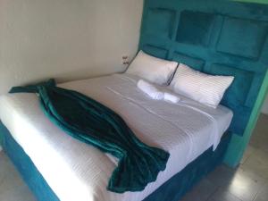 Voodi või voodid majutusasutuse Khanyisile guest house toas