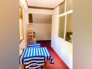Postel nebo postele na pokoji v ubytování Vinu’s Place
