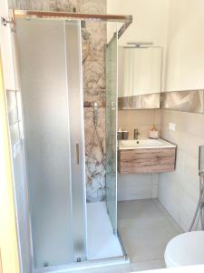 a bathroom with a shower and a sink at My Home Lampedusa in Lampedusa