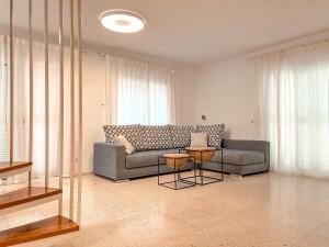 Posezení v ubytování Villa Julia, First Line, 3 Bedrooms, Stunning Ocean View and Pool in Callao Salvaje