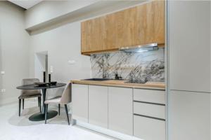 A kitchen or kitchenette at Domus Victoria IΙ Még 8 kép