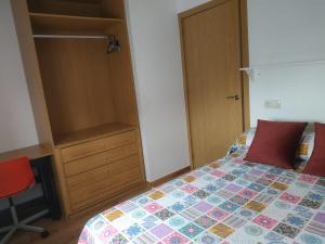 Łóżko lub łóżka w pokoju w obiekcie Nores Buenavista