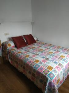 Łóżko lub łóżka w pokoju w obiekcie Nores Buenavista