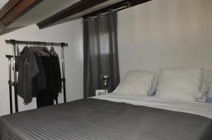 Postel nebo postele na pokoji v ubytování Cap d'Agde Naturiste - Heliovillage