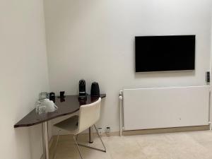 En TV eller et underholdningssystem på Bagsværd Room