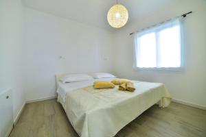 Postel nebo postele na pokoji v ubytování Apartment Maris Sinj