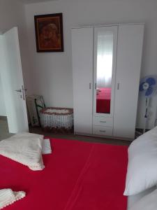 Postel nebo postele na pokoji v ubytování Apartman Jass