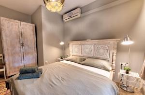 Giường trong phòng chung tại Apartments Villa Mike