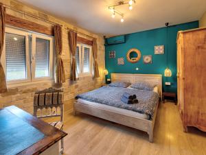 Giường trong phòng chung tại Apartments Villa Mike