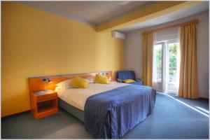 Posteľ alebo postele v izbe v ubytovaní Guest Accomodation Tamaris