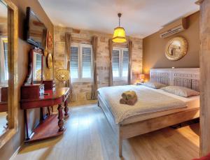 Giường trong phòng chung tại Apartments Villa Mike