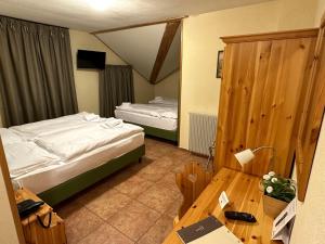 Postel nebo postele na pokoji v ubytování Hotel Trieste