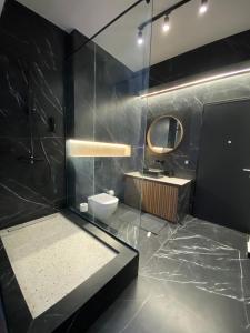 A bathroom at Athens Center Boutique Suites