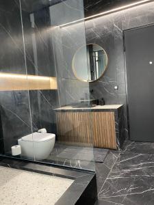 A bathroom at Athens Center Boutique Suites