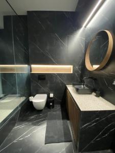 A bathroom at Athens Center Boutique Suites