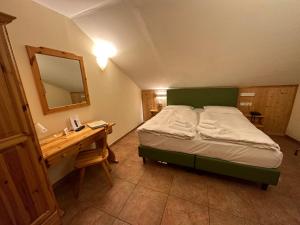 Postel nebo postele na pokoji v ubytování Hotel Trieste