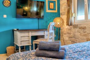 Giường trong phòng chung tại Apartments Villa Mike