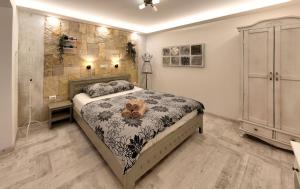 Giường trong phòng chung tại Apartments Villa Mike