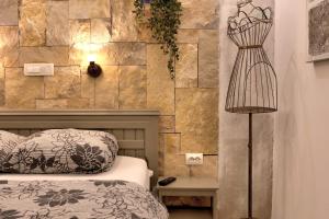 Giường trong phòng chung tại Apartments Villa Mike